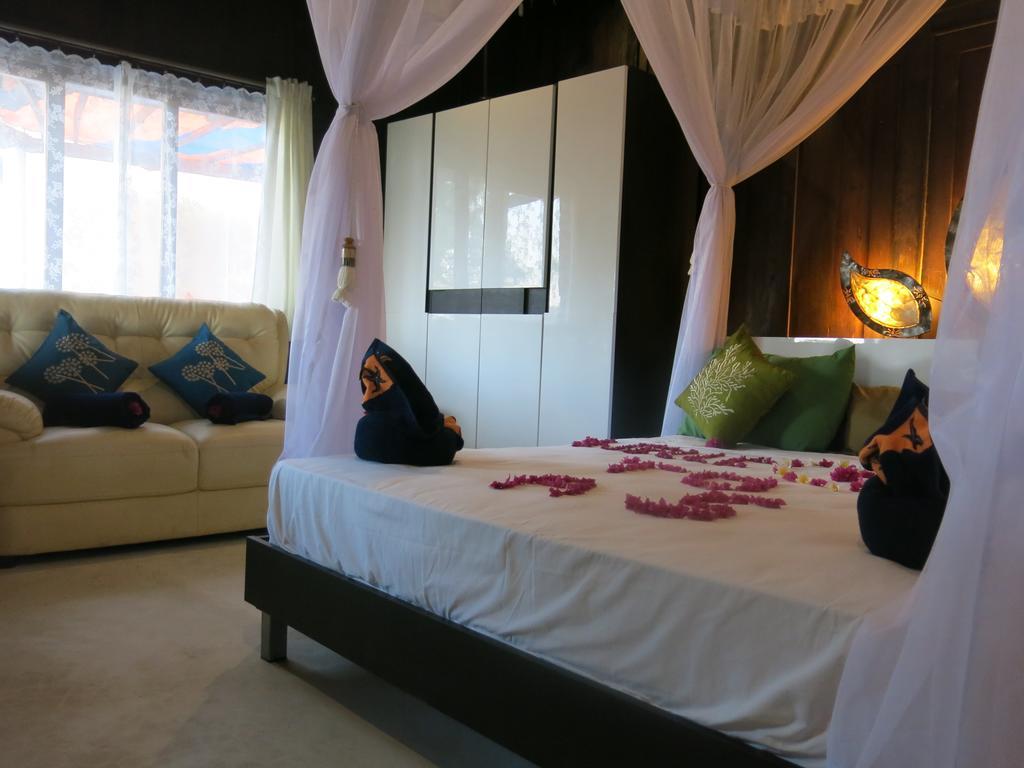 Pt Putra Momongan Menyelam Scuba Hotel Amed  Room photo